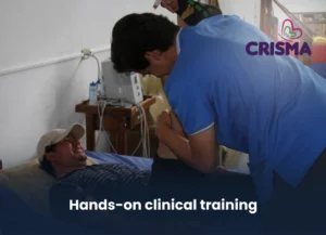 Pre-med student assisting a patient with physical therapy during CRISMA service learning program
