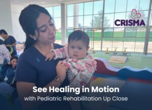 Pre-med student observing a pediatric physiotherapist working with a child in therapy.