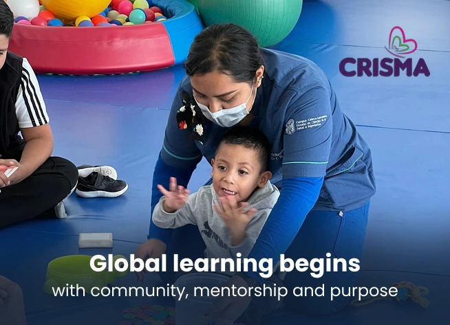 Healthcare intern assisting a child during a supervised pediatric therapy session