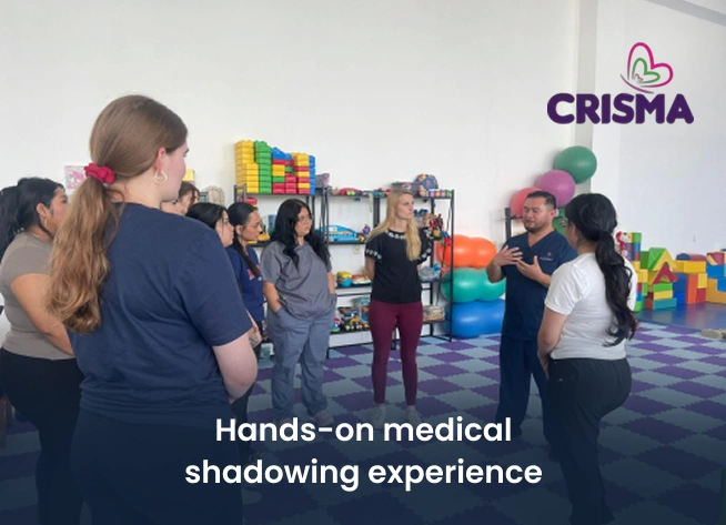 International healthcare students participating in a medical job shadowing program with hands-on clinical training